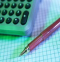 picture of a pen and a calculator